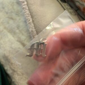 Unk Silver Initial Pendant